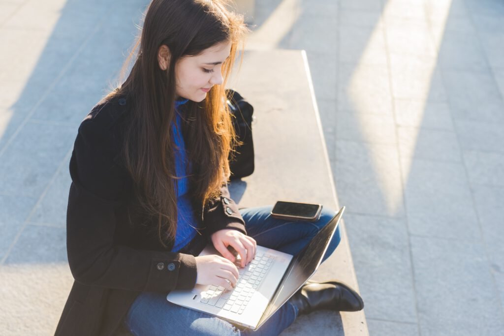 Young woman smart working using computer